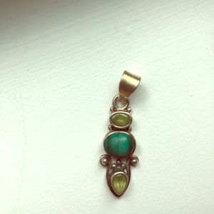 Sterling silver pendant with green  stones